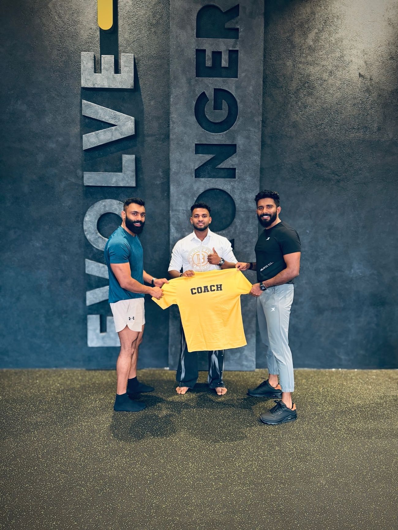 Kettlebell training at the EVOLVE STRONGER wall