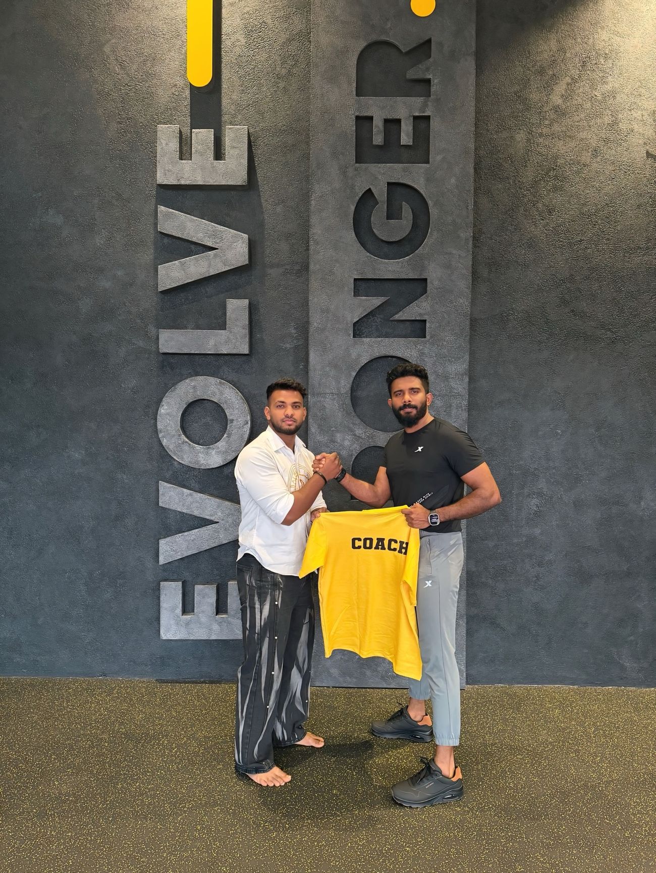 Suhail — Strength Coach at the EVOLVE STRONGER wall